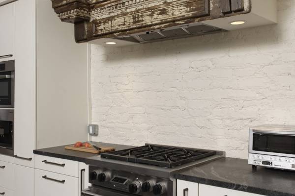 BOWA design build row home renovation in Washington, DC industrial kitchen stove hood